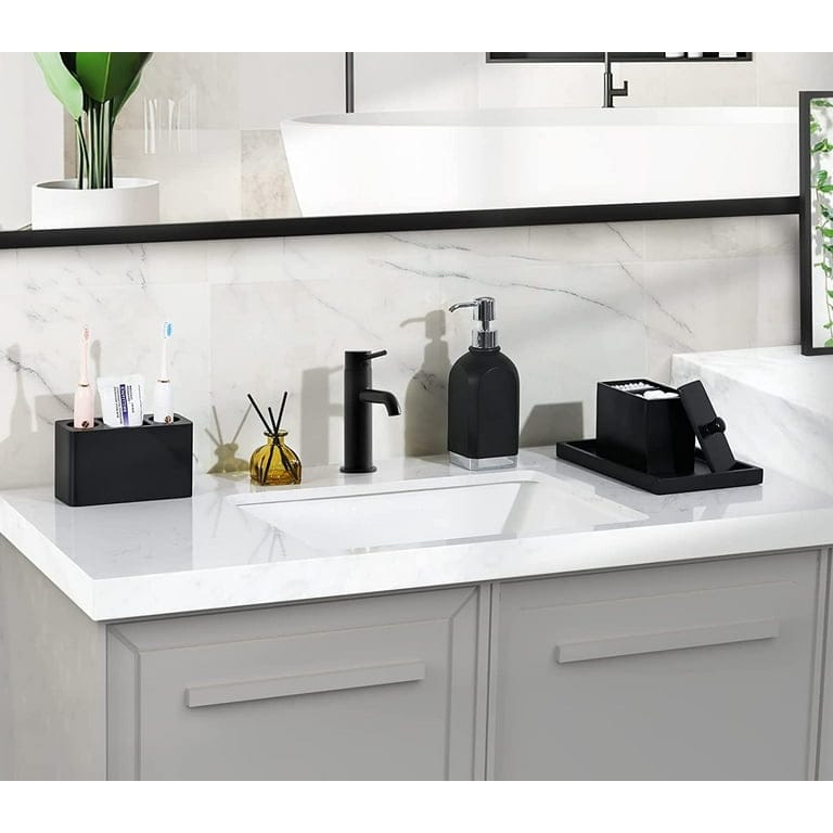 Electric toothbrush holder with toothbrushes on a bathroom counter