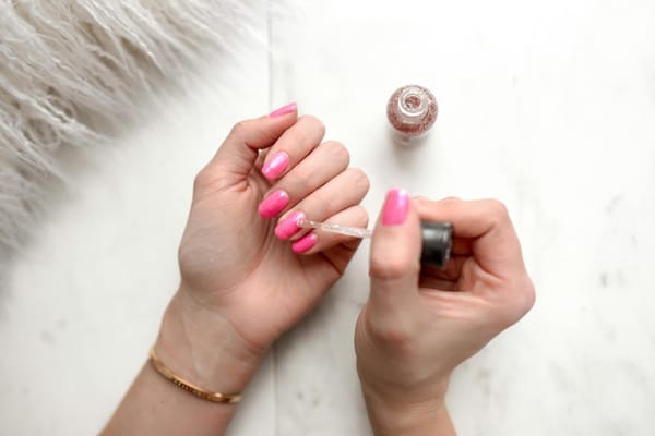 woman s pink pedicure