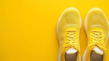 Colorful running shoes on a bright background